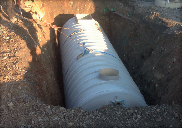 Installation of a Calona underground storage tank.