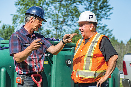 Septic system installation experts planning an Ecoflo biofilter project.