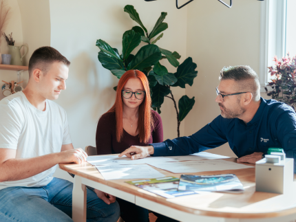 Premier Tech advising young couple about their septic system installation.