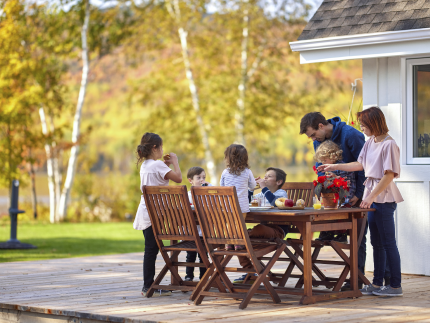 Family having dinner on their patio.