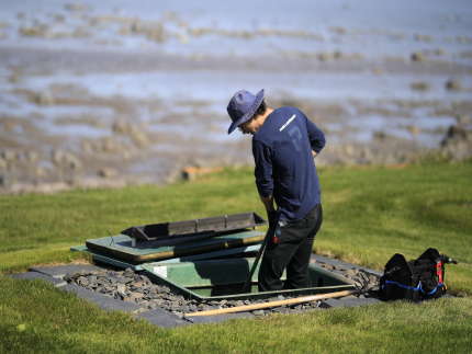 Routine Ecoflo septic system maintenance.