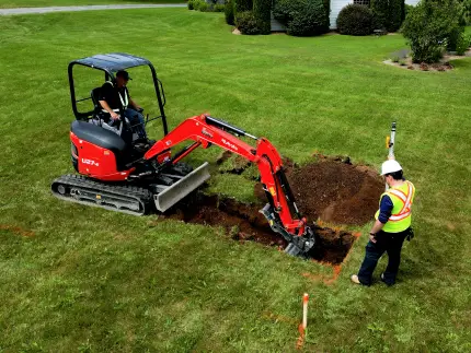 Site preparation before plastic drain field chamber installation.