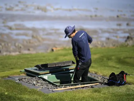 Routine Ecoflo septic system maintenance.