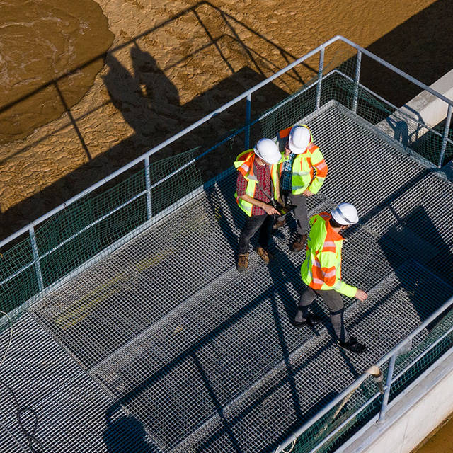 Premier Tech Water and Environment technicians checking the operation of a municipal wastewater treatment plant in India.