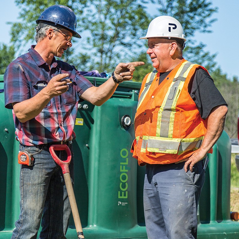 Premier Tech Water and Environment installers preparing a rural site for the polyethylene Ecoflo biofilter septic system.