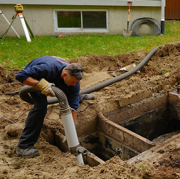 Septic contractor replacing a failed Bionest-type septic system with the Ecoflo compact biofilter.