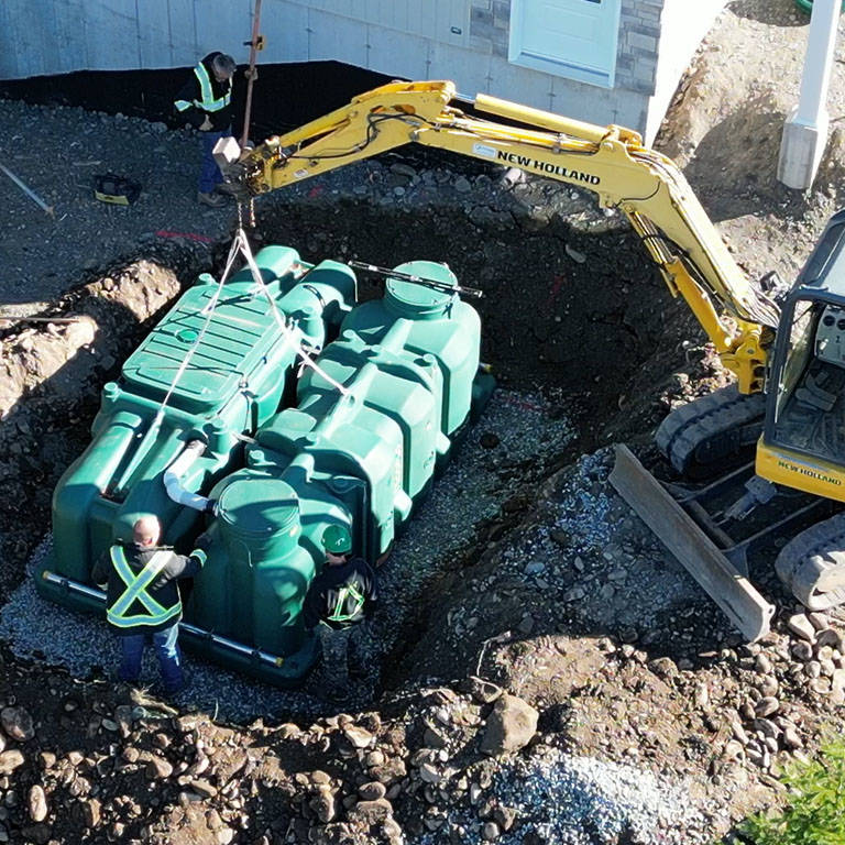 Installation of the Pack model of the polyethylene Ecoflo compact biofilter at a residential site in Pennsylvania.