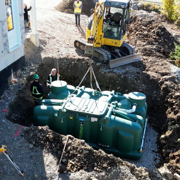 Ecoflo compact biofilter installation on a small lot.