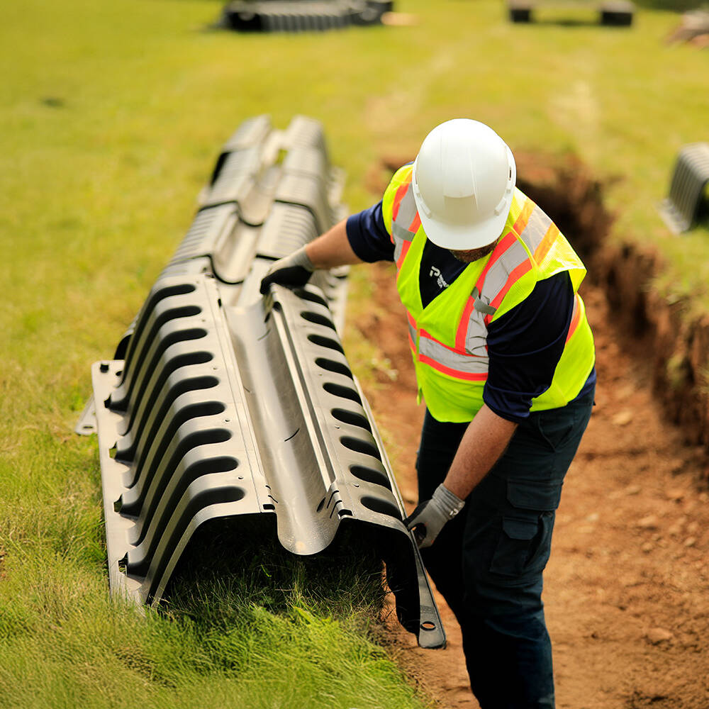 Plastic leach field chambers installation.