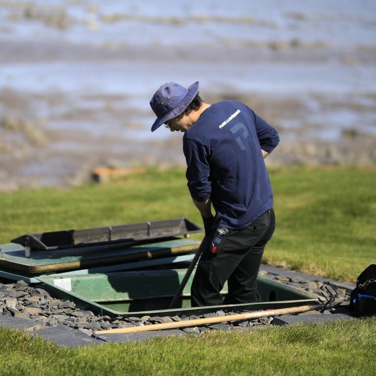 Routine Ecoflo septic system maintenance.