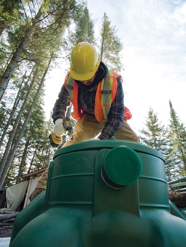 Premier Tech Water and Environment partner installing the Ecoflo septic system in a small cottage lot.