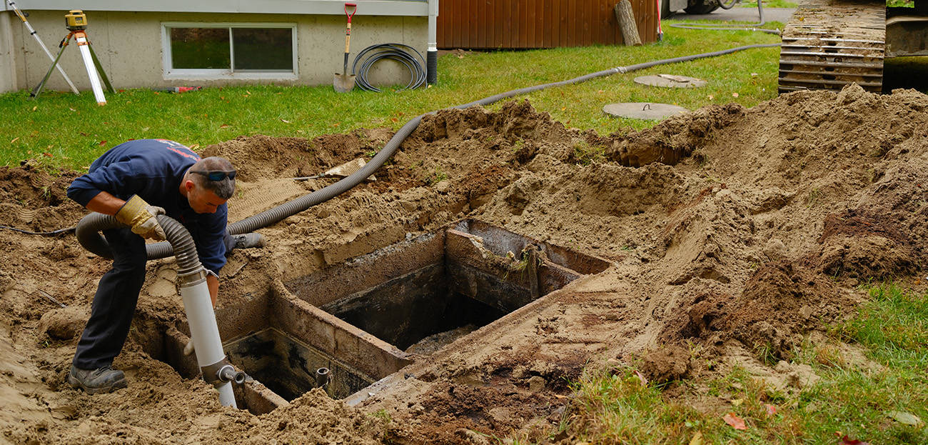 Septic contractor replacing a failed Bionest-type septic system with the Ecoflo compact biofilter.