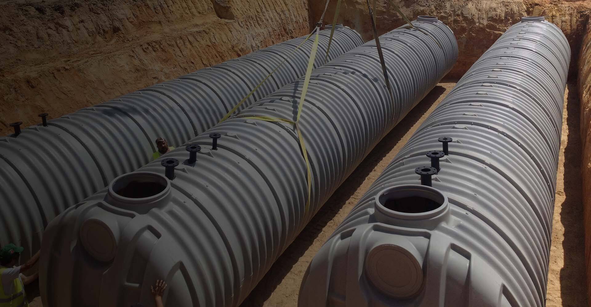 Installation of three Rewatec underground water storage tanks.