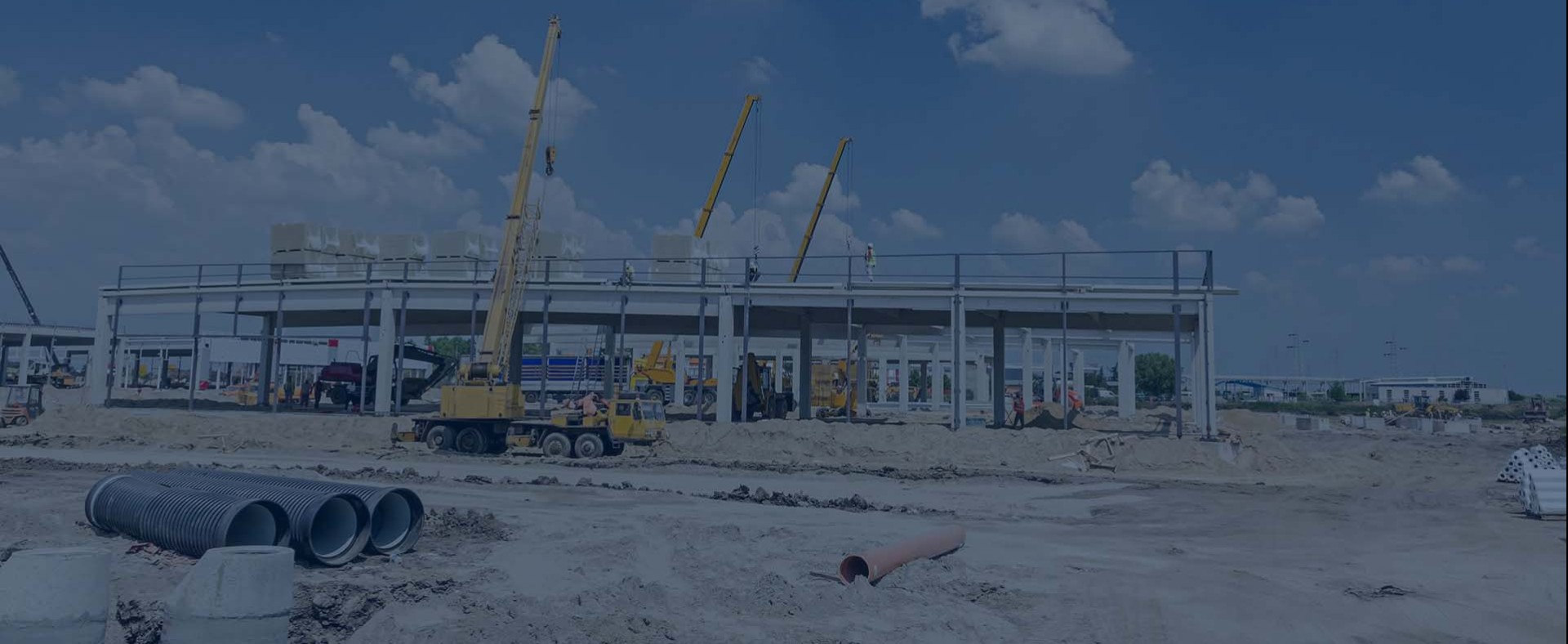 Construction site making use of Premier Tech Water and Environment's portable sanitation systems, including portable toilets.