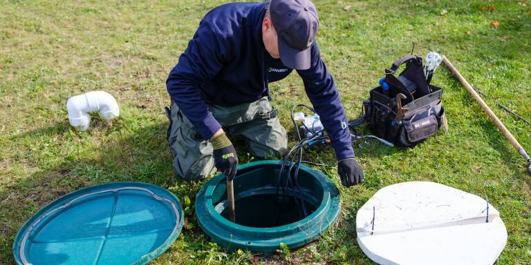 Repairing a septic pump float that triggers an alarm.
