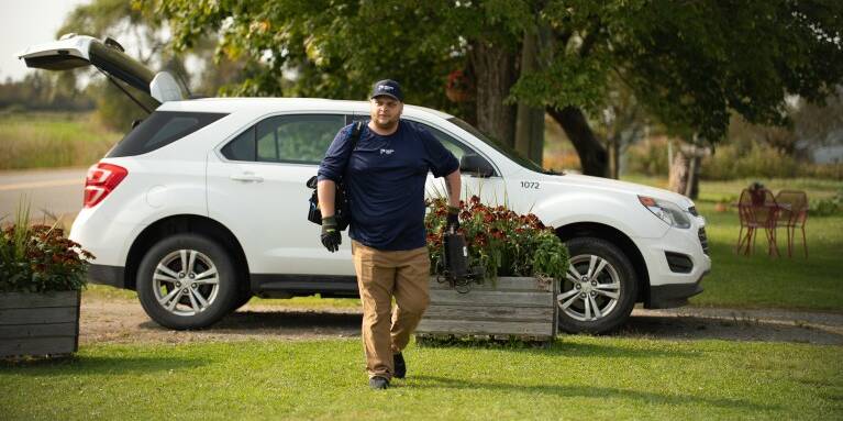 Ecoflo septic system service visit at a residential property.