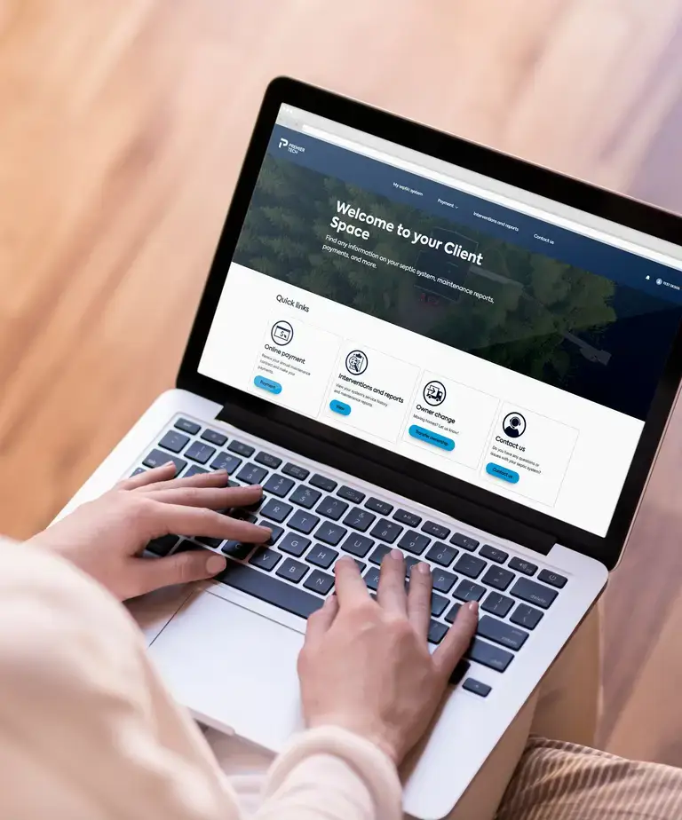 Client using Premier Tech Water and Environment's Client Space on a computer.