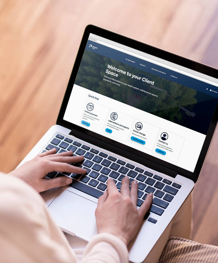 Client using Premier Tech Water and Environment's Client Space on a computer.