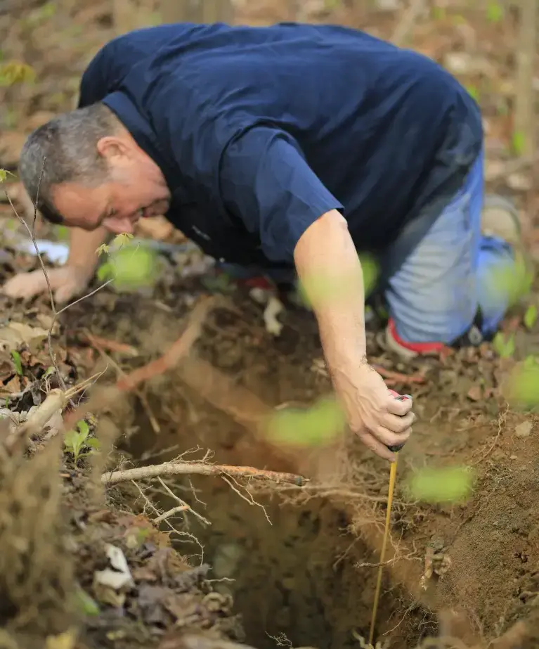 Trial hole test for a septic installation in the UK.