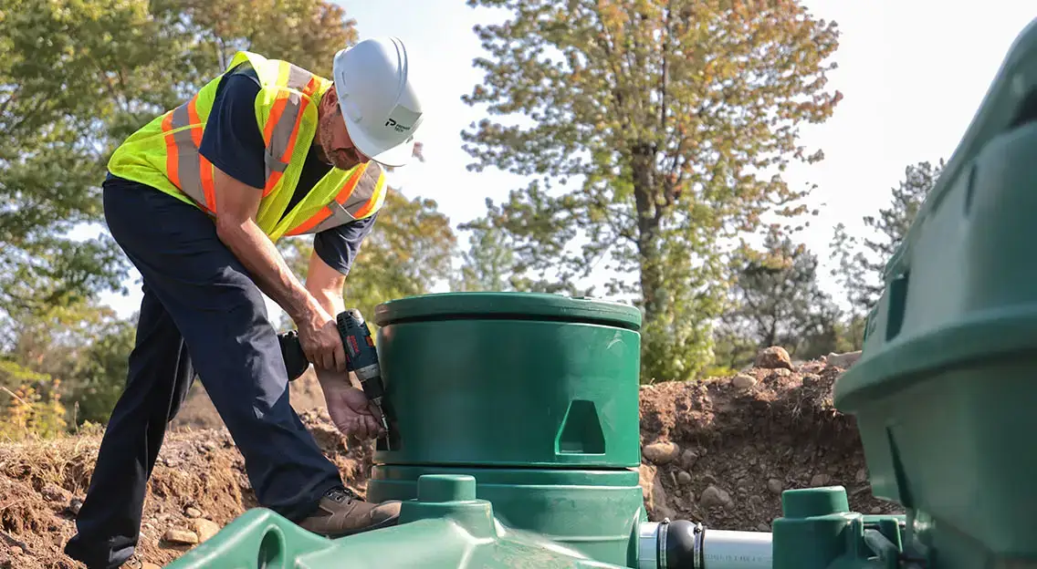 Premier Tech Water and Environment partner installing the Pack model of the Ecoflo biofilter septic system. 