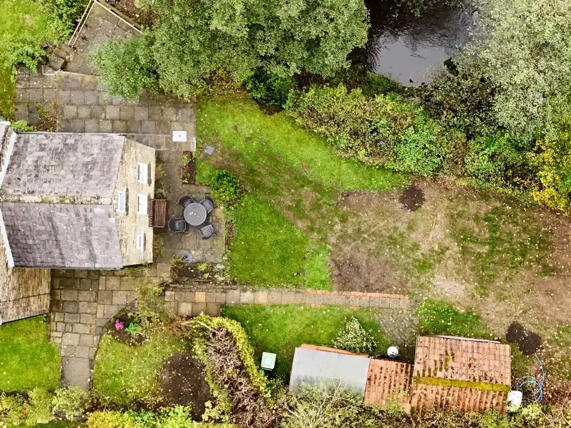 Septic tank in the UK with limited space for a drainage field.