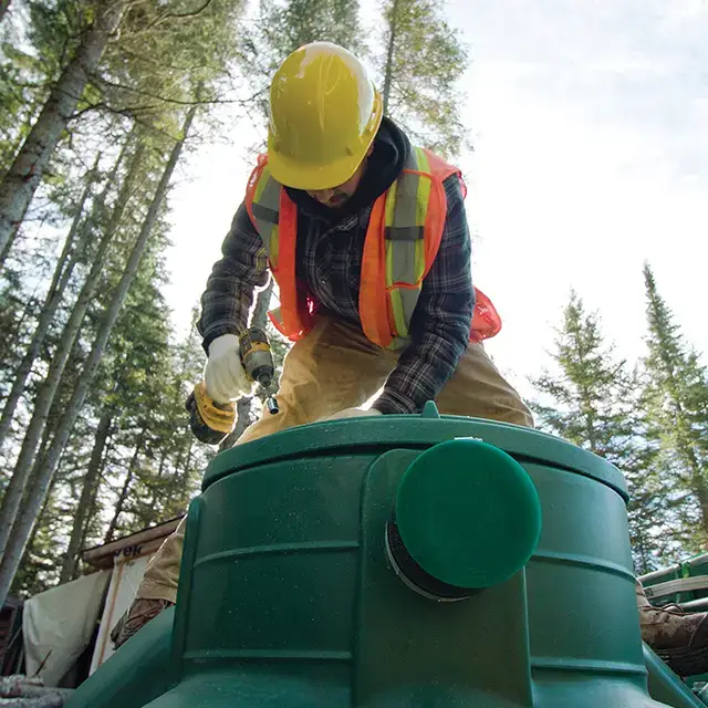 Premier Tech Water and Environment partner installing the Ecoflo septic system in a small cottage lot.