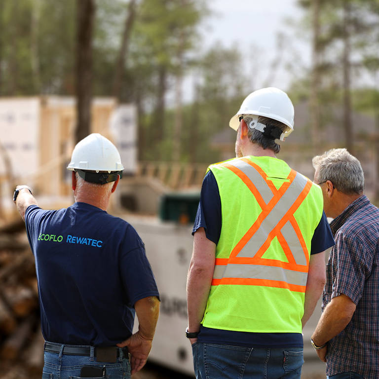 Commercial property owner with design professionals from Premier Tech Water and Environment in the UK.