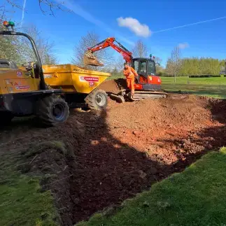 Premier Tech repairing a drainage field.