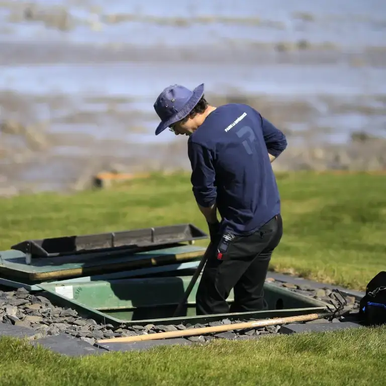 Routine Ecoflo septic system maintenance.