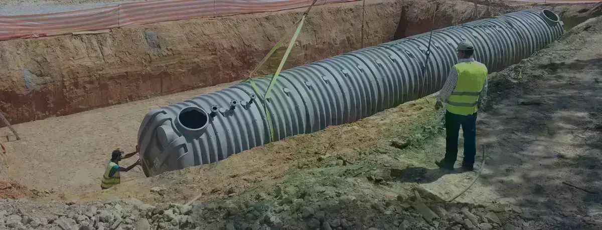 Premier Tech Water and Environment and partners installing a high-capacity underground liquid storage tank in Portugal.