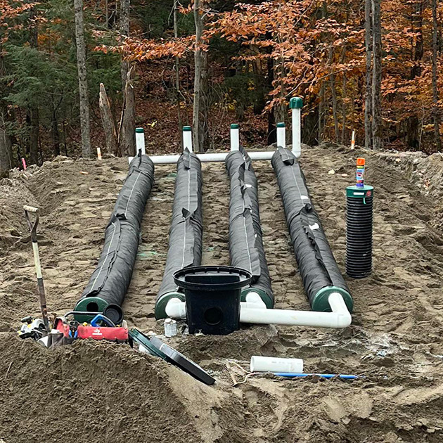 Installation d'une installation septique System O avec les conduites Enviro Septic.